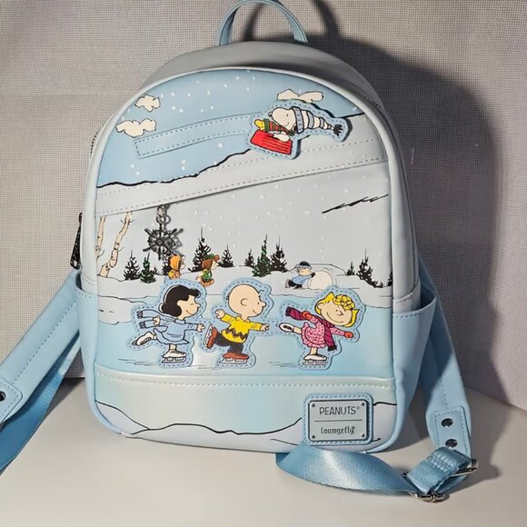 LOUNGEFLY Peanuts Charlie Brown Snoopy Ice Skating Winter Christmas Mini Backpac - Picture 1 of 9
